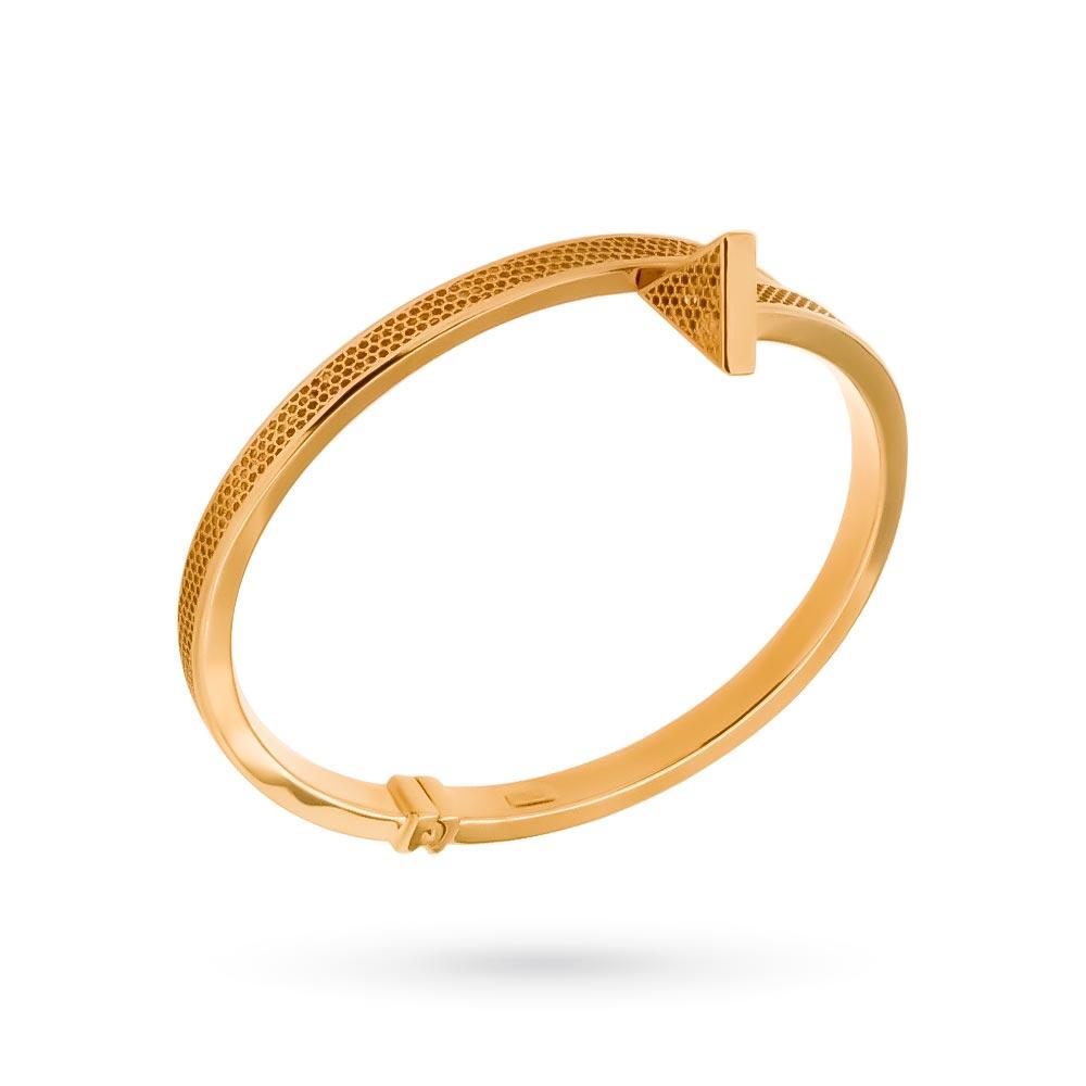 Rigid bracelet with cuff and perforations in 18kt yellow gold - LUSSO ITALIANO