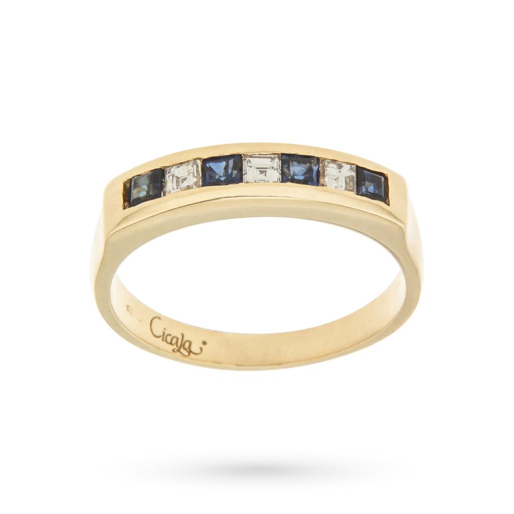 Sortija Riviera en oro amarillo con zafiros y diamantes carrè