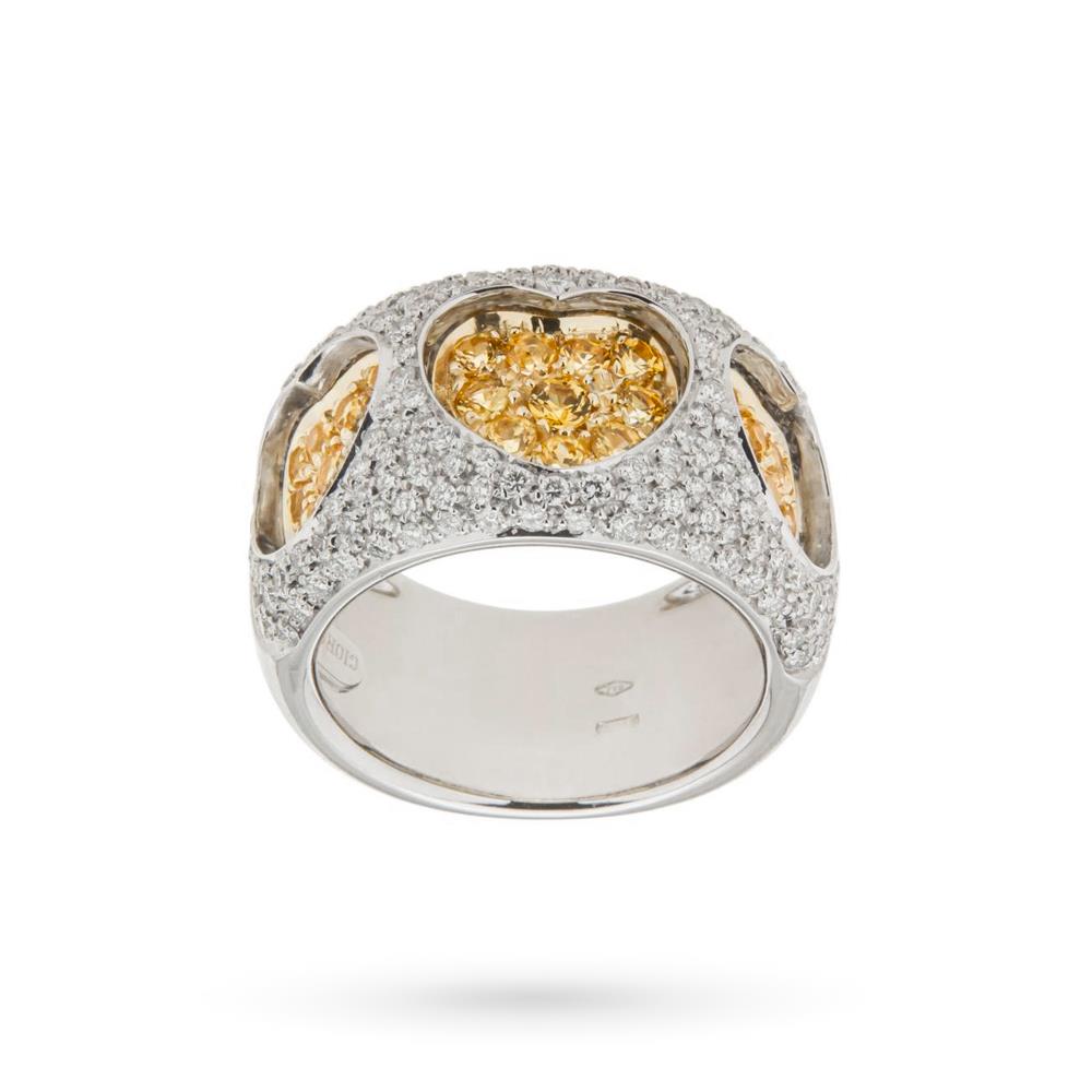 Large gold band ring with hearts of diamonds and yellow sapphires