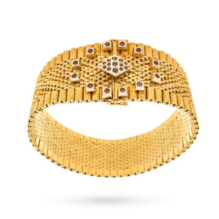 Semi-rigid vintage bracelet in gold, rubies and sapphires