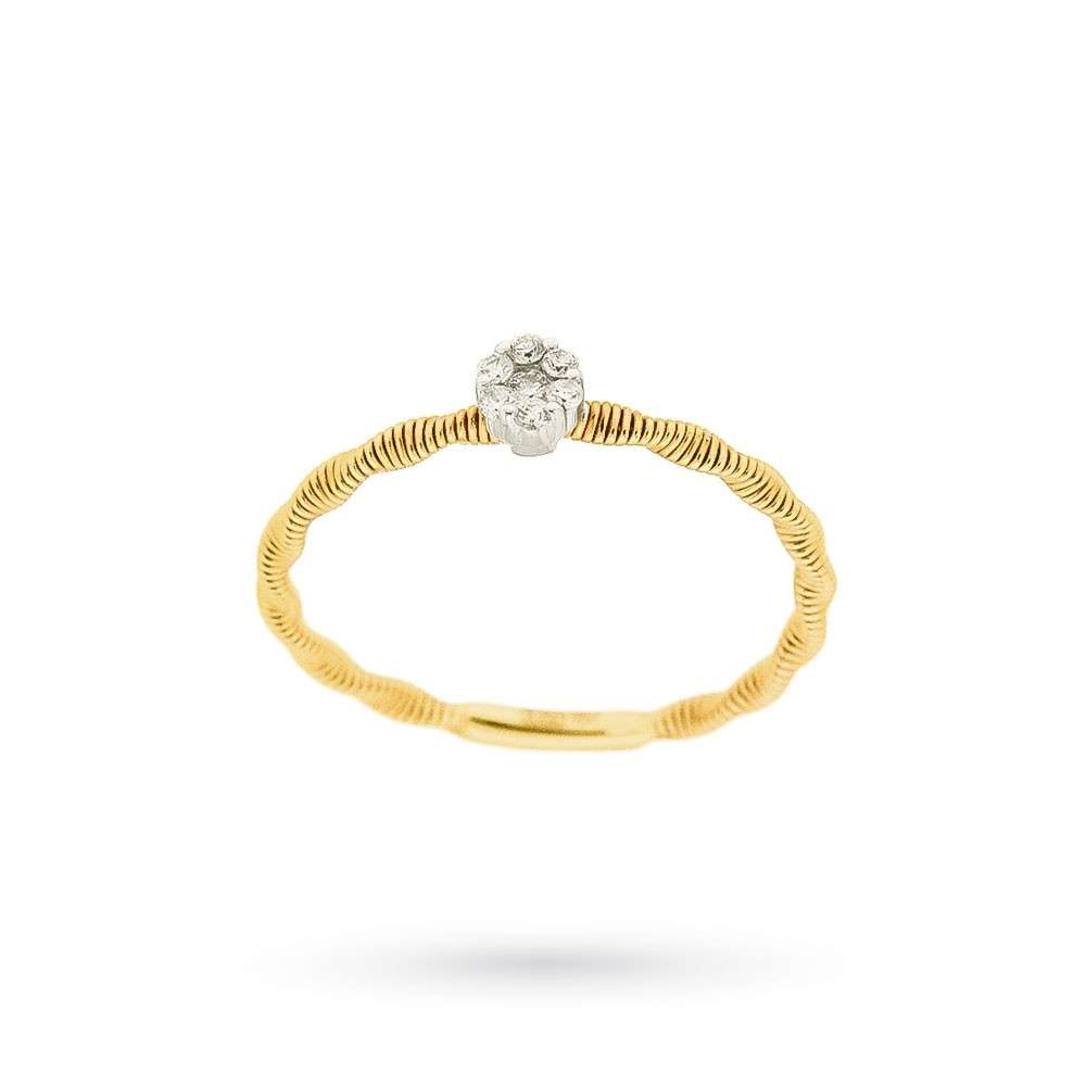 Anello zigrinato con diamante 0.06 ct in oro giallo