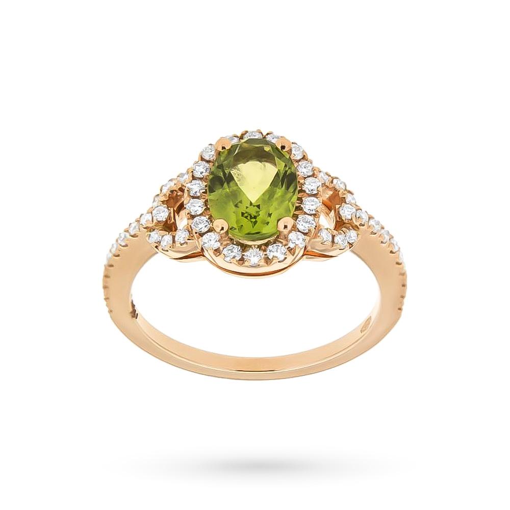 Anillo ovalado de oro amarillo con peridoto verde 1.47ct y diamantes 0.39ct