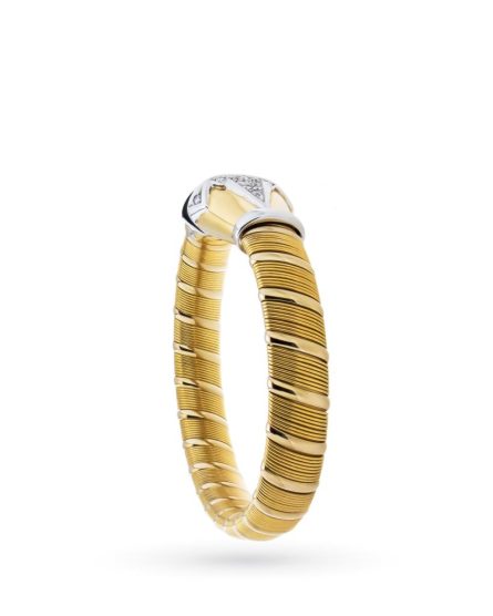 Pulsera rígida en oro amarillo y blanco con diamantes.