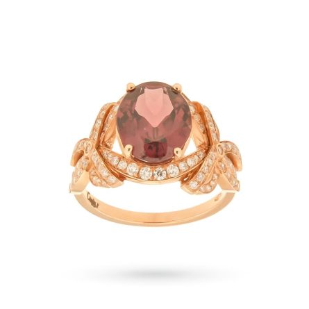 Gold ring with oval pink rhodolite 4.08ct and diamonds 0.55ct