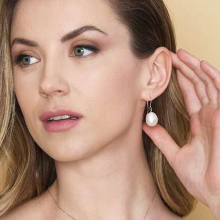 Orecchini con perla barocca in oro 18kt Ø 12 mm