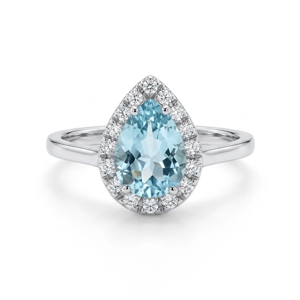 Anello in oro bianco con acquamarina a goccia da 0,69 ct e contorno di diamanti da 0,14 ct. Design elegante e luminoso in 2,98 g, misura 12. Scopri la qualità orafa.