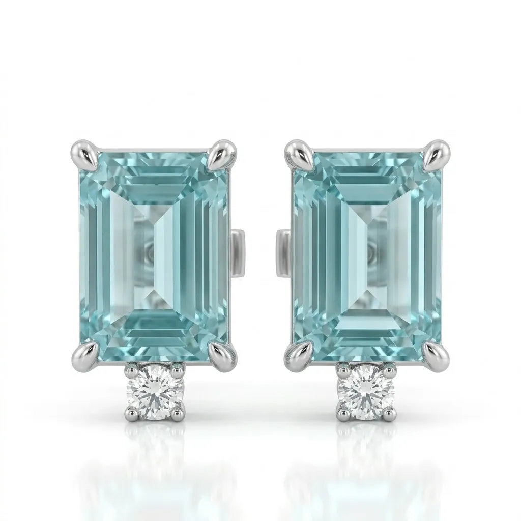 Orecchini a lobo in oro bianco con acquamarine ottagonali da 1,72 ct e diamanti in testa da 0,03 ct. Un design geometrico ed elegante da 2,60 g. Scopri l'eccellenza orafa.