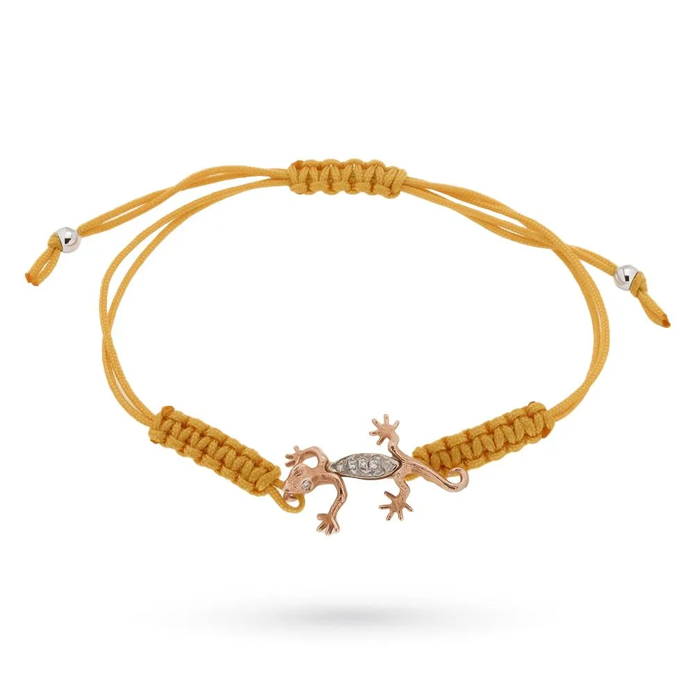 Bracciale con geco in oro rosa e diamanti su cordino giallo regolabile