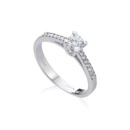 Anello solitario con brillanti laterali in oro bianco 18kt con diamanti 0,60ct